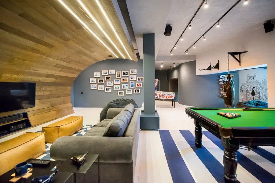 The ultimate man cave featuring a skate bowl by Inhouse
