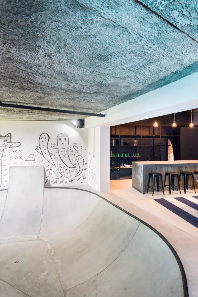 The ultimate man cave featuring a skate bowl by Inhouse