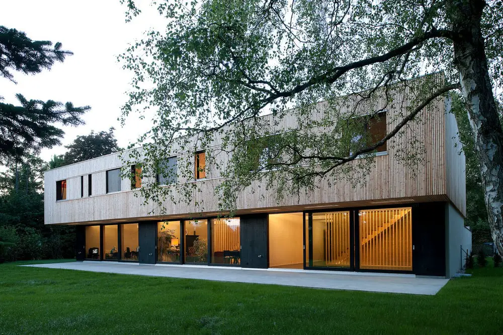 The special cladding of Villas Jonc makes the structures pop against the verdant landscape.
