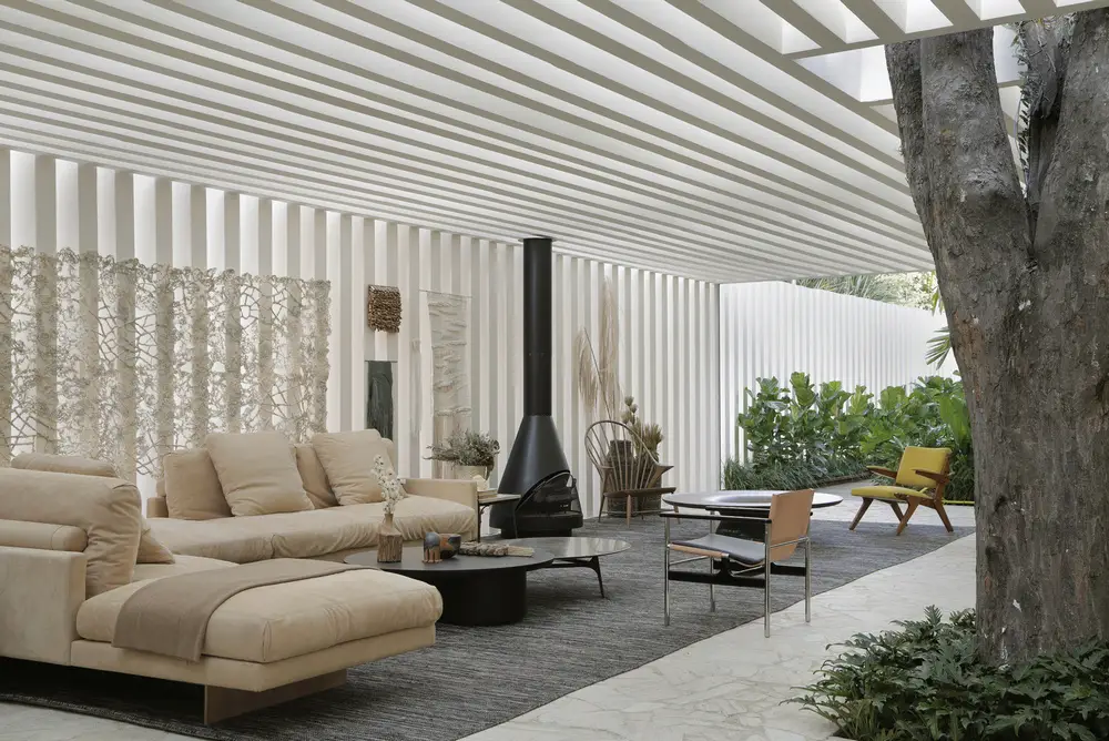 Sibipirunas House blurs the line between indoor and outdoor living.